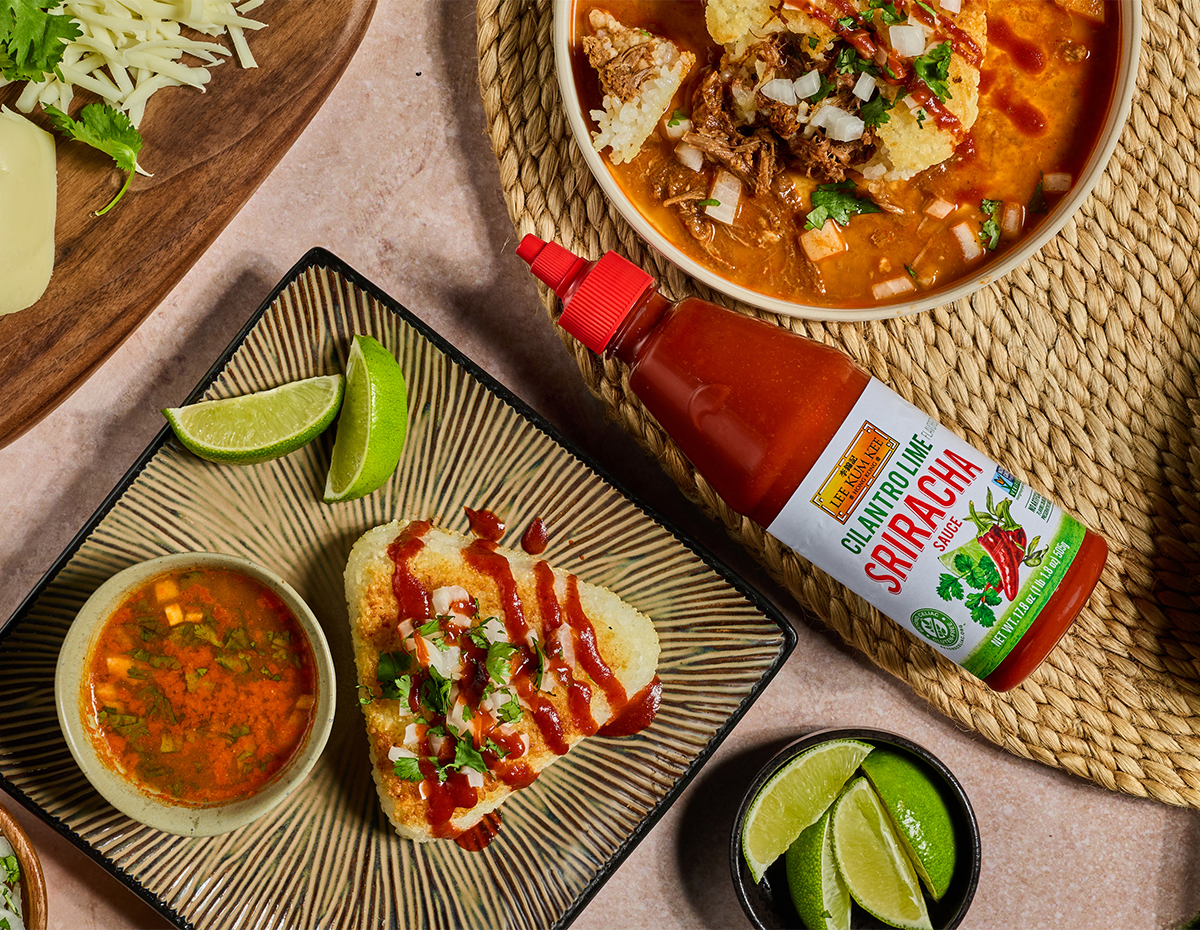 A yaki onigiri recipe stuffed with leftover birria and Oaxaca cheese, served with consommé and Cilantro Lime flavored Sriracha.