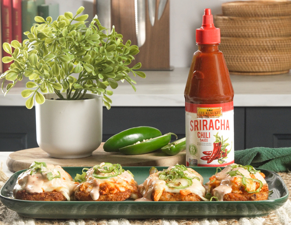 Prepared Buffalo chicken hashbrown potatoes on a serving platter, alongside the Lee Kum Kee Sriracha Chili Sauce used to make them