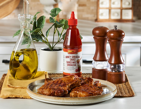 A honey sriracha pork chops recipe with Lee Kum Kee Honey Sriracha.