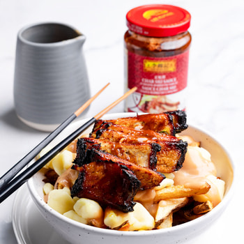A poutine recipe topped with Lee Kum Kee char siu gravy.