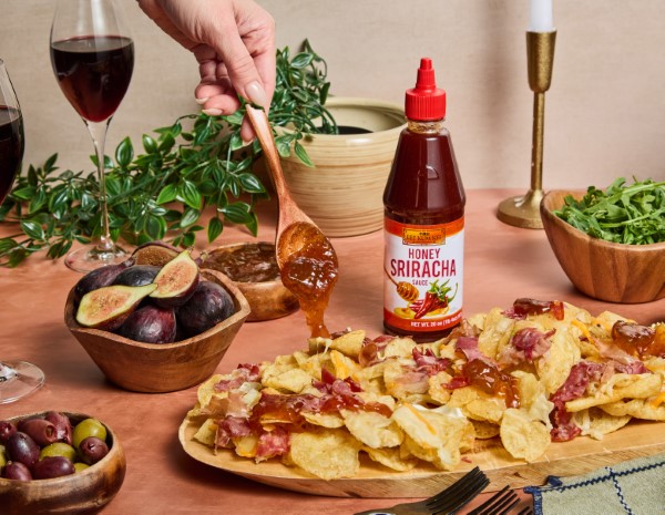 Charcuterie chips on a tray made with a fig jam recipe featuring Lee Kum Kee Honey Sriracha.