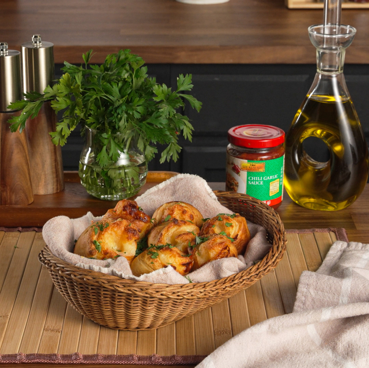 A cheesy garlic cruffins recipe with some heat from Lee Kum Kee Chili Garlic Sauce.