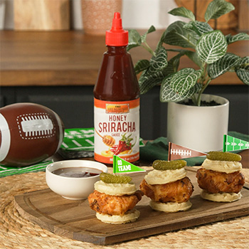 A chicken and waffle sliders recipe with Honey Sriracha sauce.