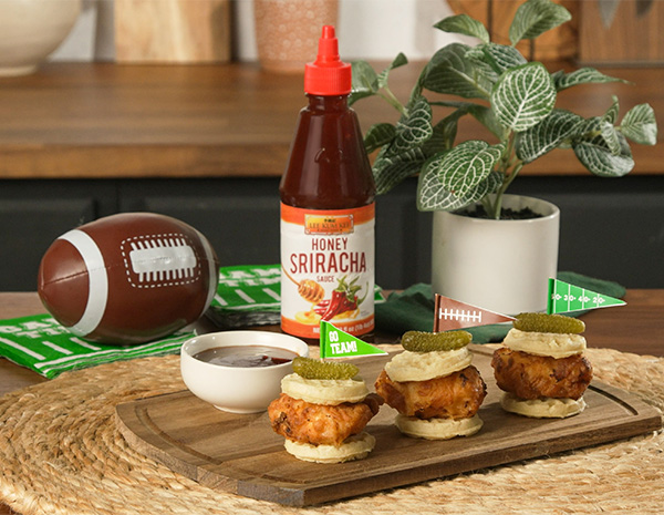 A chicken and waffle sliders recipe with Honey Sriracha sauce.