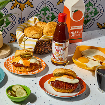A breakfast biscuit sandwich recipe with chili crisp hot honey.