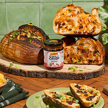 A sourdough recipe made with chili crisp, cheddar, and scallions.