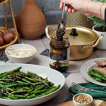 A Chinese green beans recipe made with Lee Kum Kee Black Bean Garlic Sauce