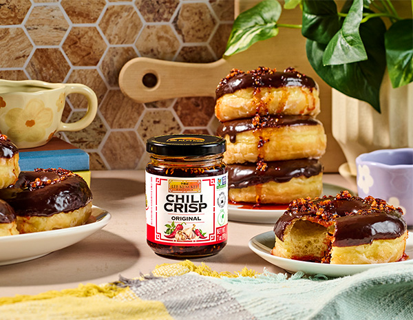 A chocolate donut recipe with a chili crisp topping.