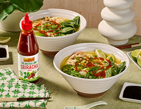 A chicken pho recipe served with Cilantro Lime Sriracha.