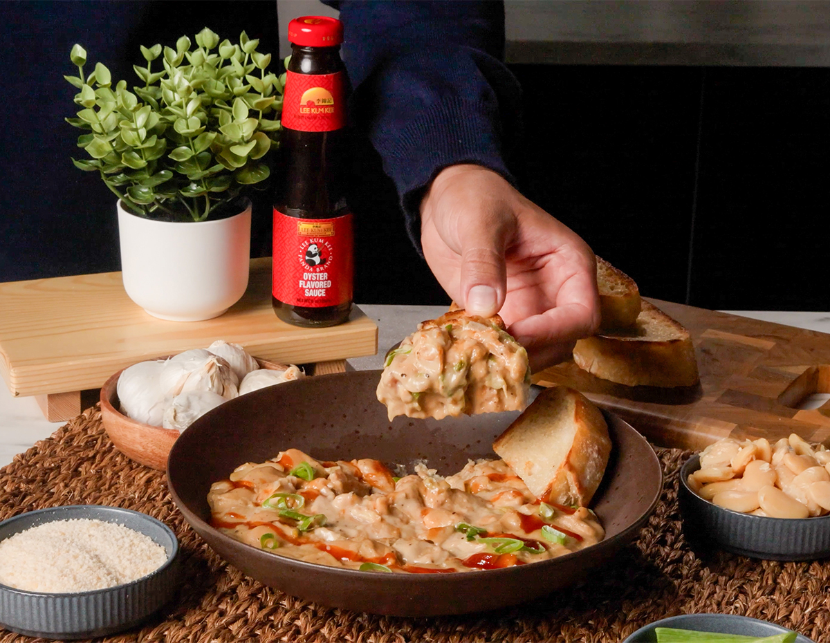 A creamy beans recipe infused with garlic parmesan, oyster sauce, and honey sriracha.