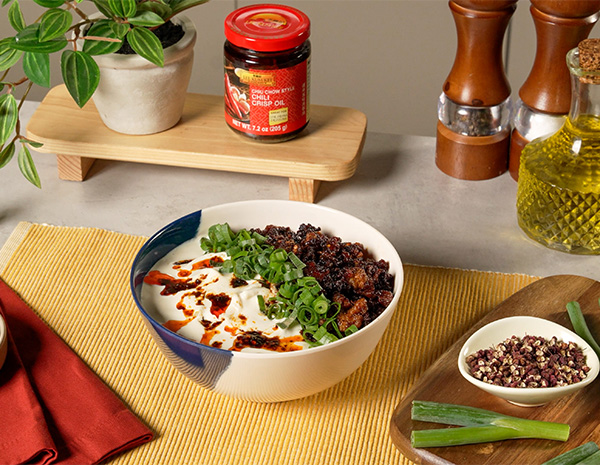 A creamy mapo tofu udon recipe topped with Chili Crisp Oil.
