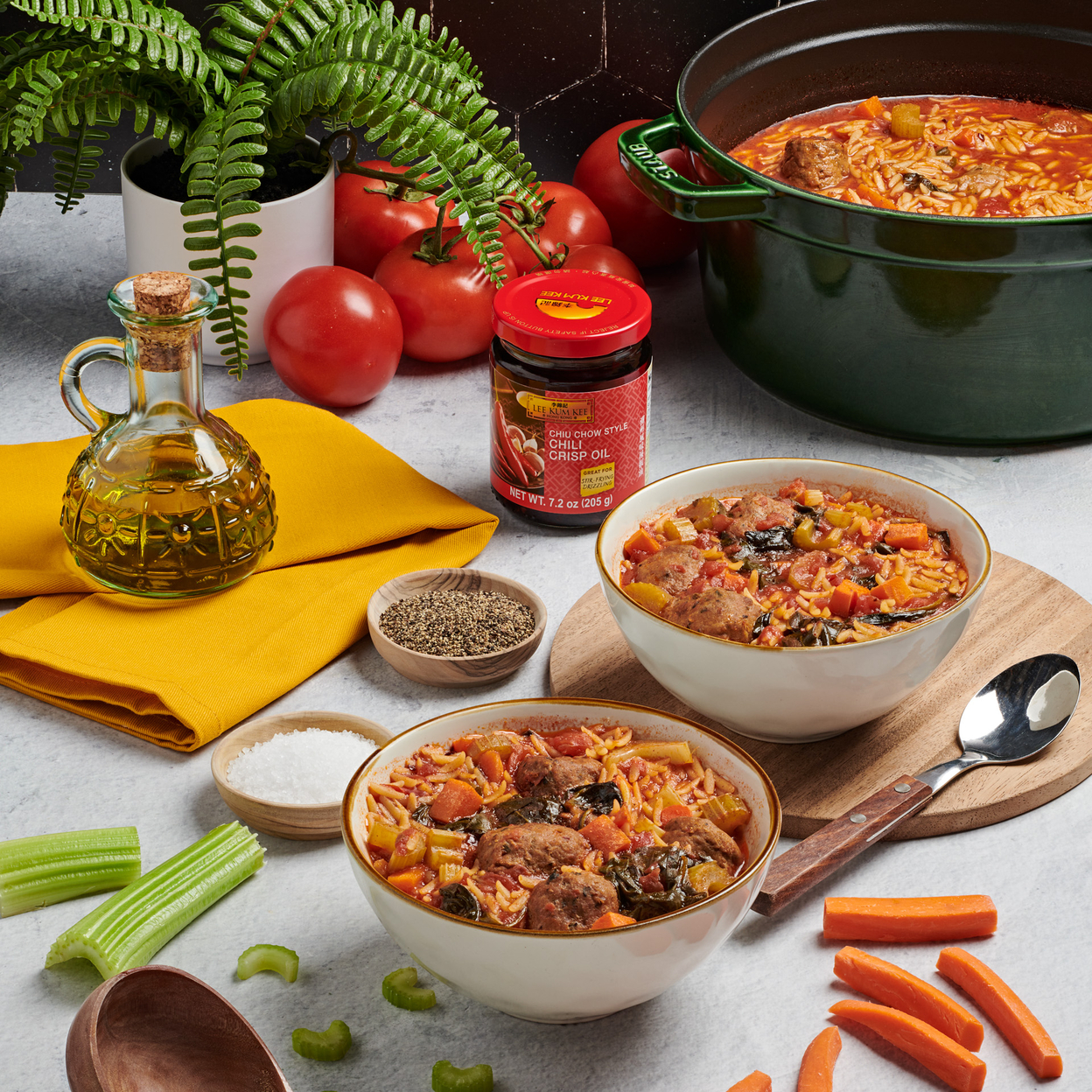 An easy pastina soup recipe with creamy tomato flavors, drizzled with Lee Kum Kee Chili Crisp Oil.