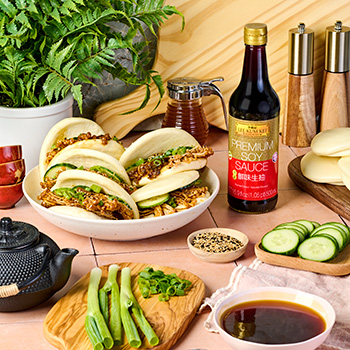 A crispy enoki mushroom recipe in a bao with a Lee Kum Kee soy sauce glaze.