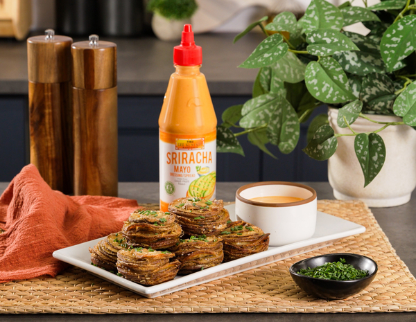 A recipe of crispy Parmesan Potato Stacks with a side of Lee Kum Kee Sriracha Mayo for dipping.