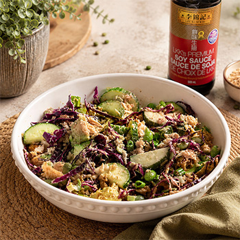 A crispy rice salad recipe loaded with Dungeness crab and a citrus-soy dressing.