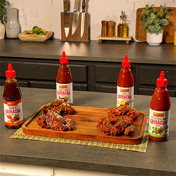 Easy chicken wing recipes, done four ways, each using a different sriracha sauce.