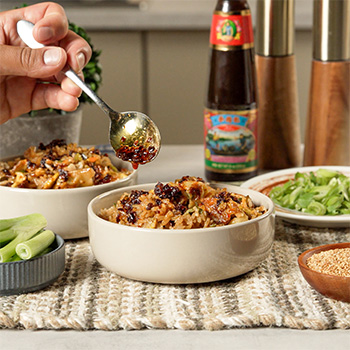An easy fried rice recipe made with frozen dumplings and seasoned with oyster sauce.