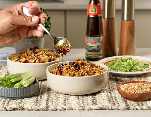 An easy fried rice recipe made with frozen dumplings and seasoned with oyster sauce.