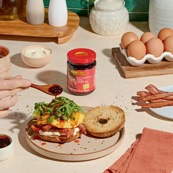A breakfast bagel sandwich recipe with Lee Kum Kee Chili Crisp.