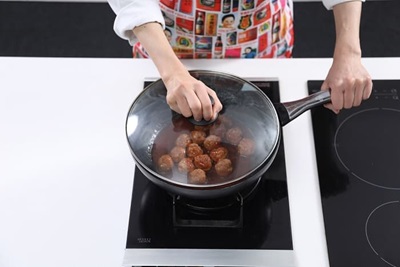 Cover and cook on low heat for about 5 minutes until meat balls are done.