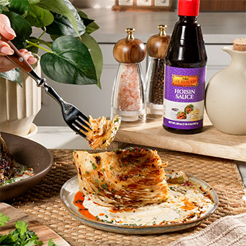A grilled cabbage recipe dressed with a spicy yogurt sauce.