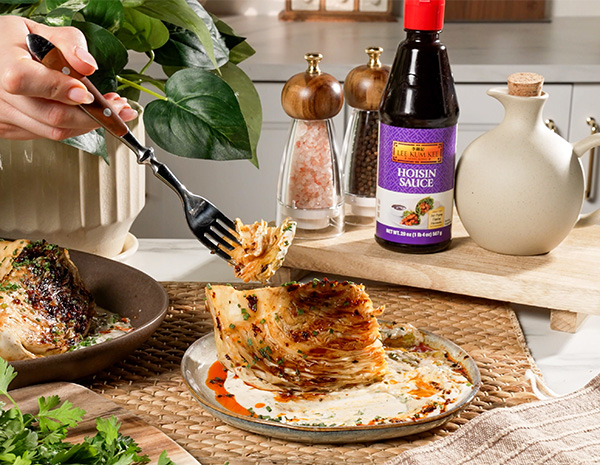 A grilled cabbage recipe dressed with a spicy yogurt sauce.