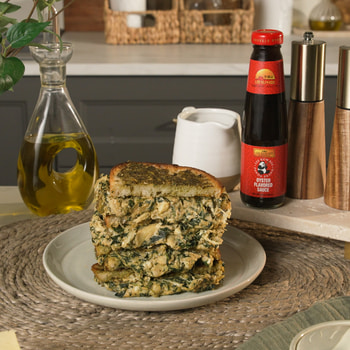 A grilled cheese sandwich recipe with pesto crust featuring Lee Kum Kee oyster sauce.