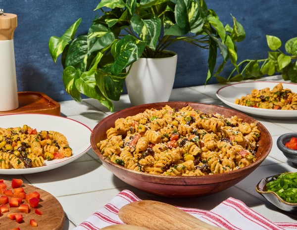 A grilled corn pasta salad with a creamy spicy chipotle dressing.