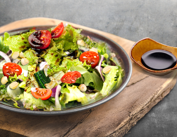 Organic salad with honey vinegar sauce