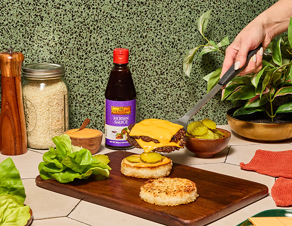 A hoisin smash burger recipe made with crispy rice buns.
