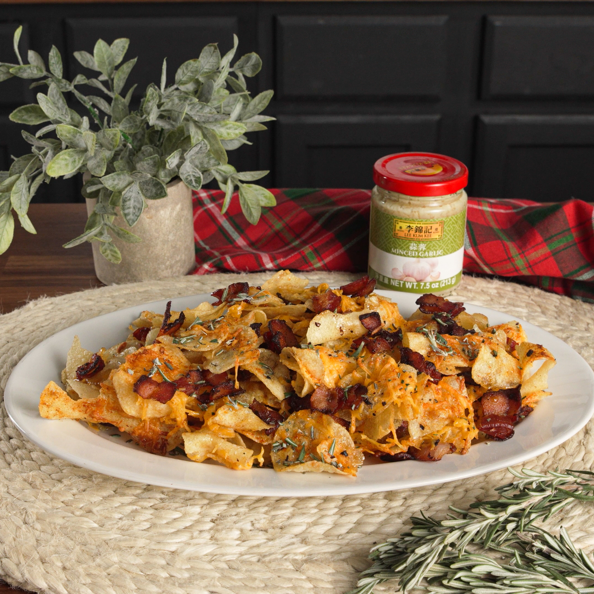 A holiday loaded chips recipe with cheese, bacon, and Lee Kum Kee Minced Garlic.