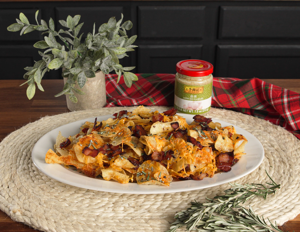 A holiday loaded chips recipe with cheese, bacon, and Lee Kum Kee Minced Garlic.