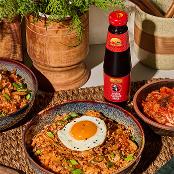 A kimchi fried rice recipe with ground pork added for extra protein, seasoned with oyster sauce.