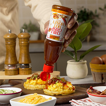 A Loaded hashbrowns recipe for brunch made in a waffle maker.