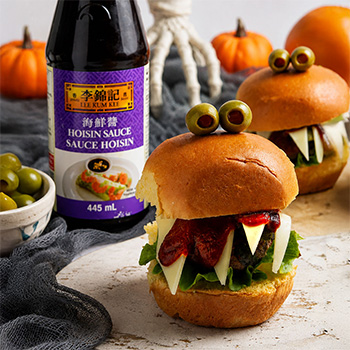 A meatball sliders recipe made with hoisin sauce, shaped like monsters for a Halloween party recipe