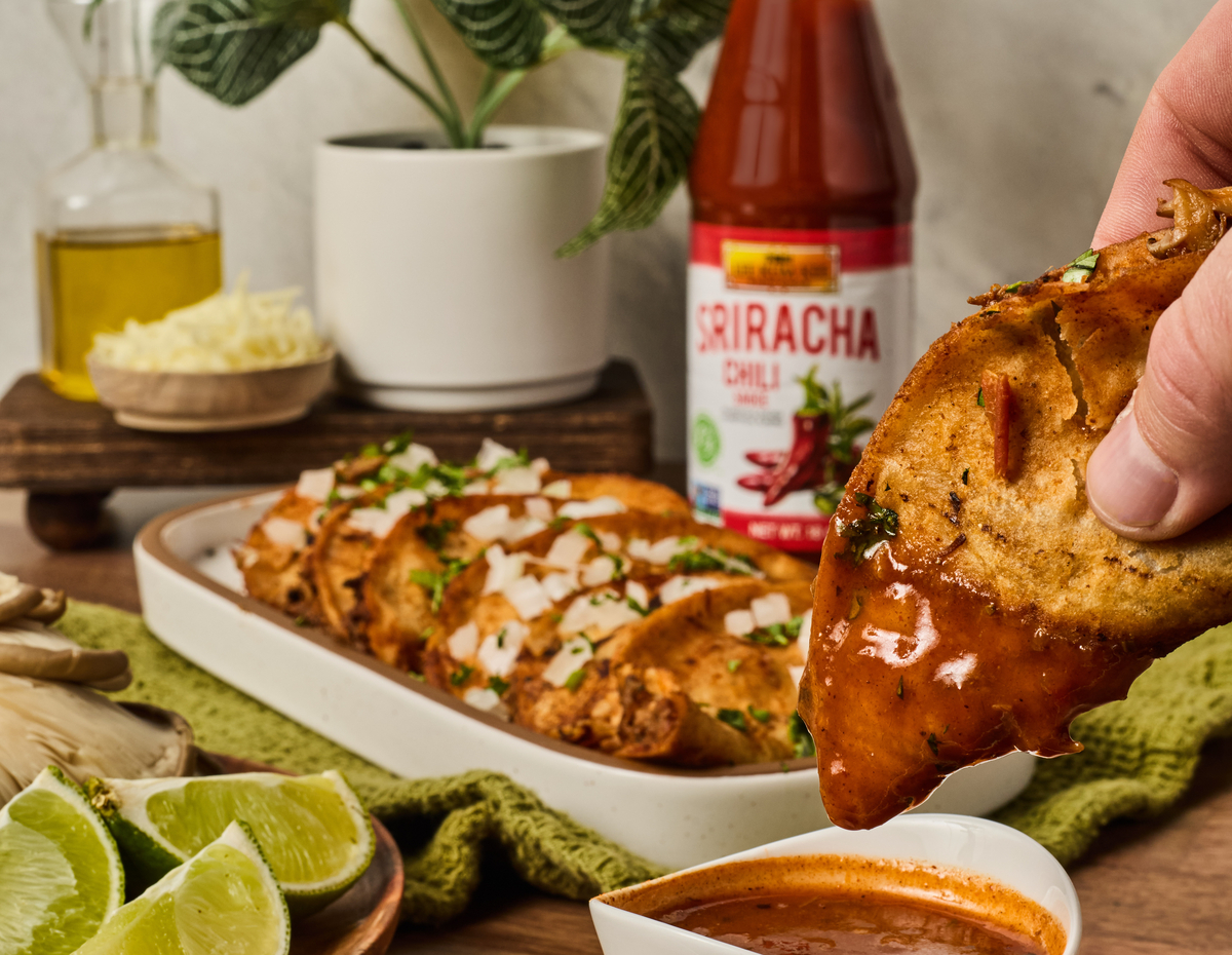 A vegan mushroom birria style tacos recipe made with Lee Kum Kee Sriracha Chili Sauce.