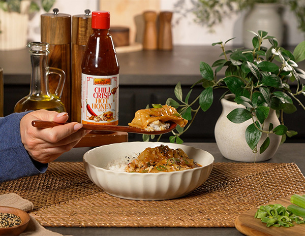 A one pan dumpling bake recipe made with a coconut curry sauce and served over rice.