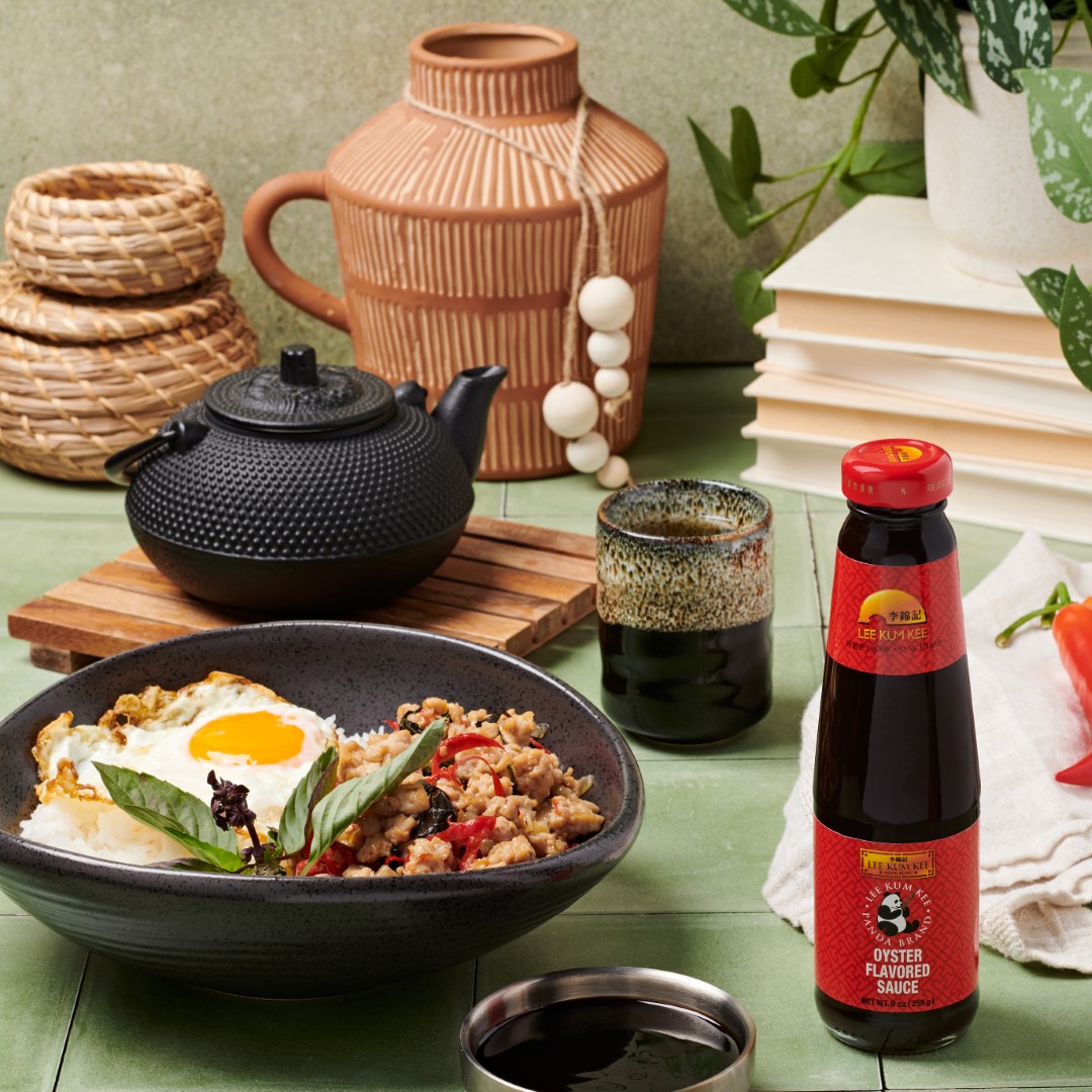 A bowl of Thai Basil Chicken, rice, and a fried egg, made with Lee Kum Kee Panda Brand Oyster Flavored Sauce.