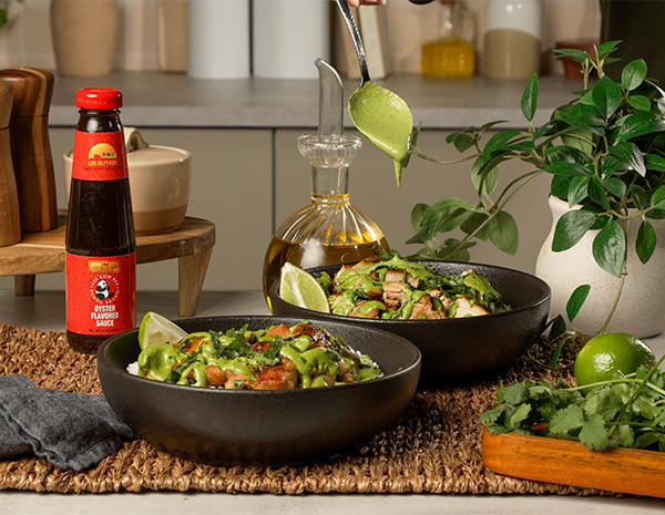 A Peruvian style chicken and rice bowl recipe topped with aji verde sauce.