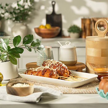 A Korean corn dog recipe with pizza flavors and Sriracha dipping sauces.