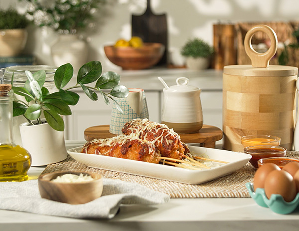 A Korean corn dog recipe with pizza flavors and Sriracha dipping sauces.