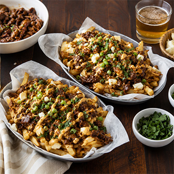 A poutine recipe topped with Canadian-Chinese style ginger beef.