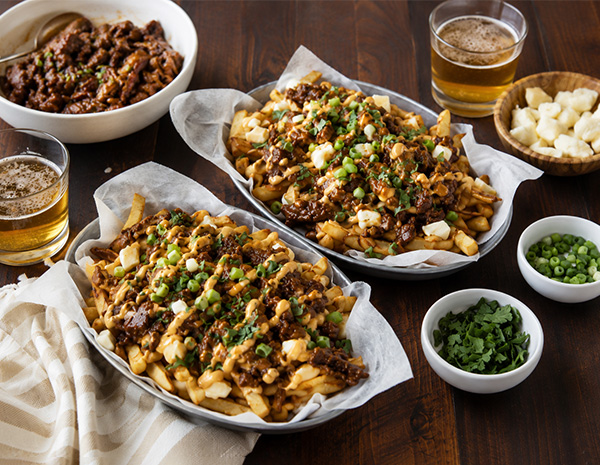 A poutine recipe topped with Canadian-Chinese style ginger beef.
