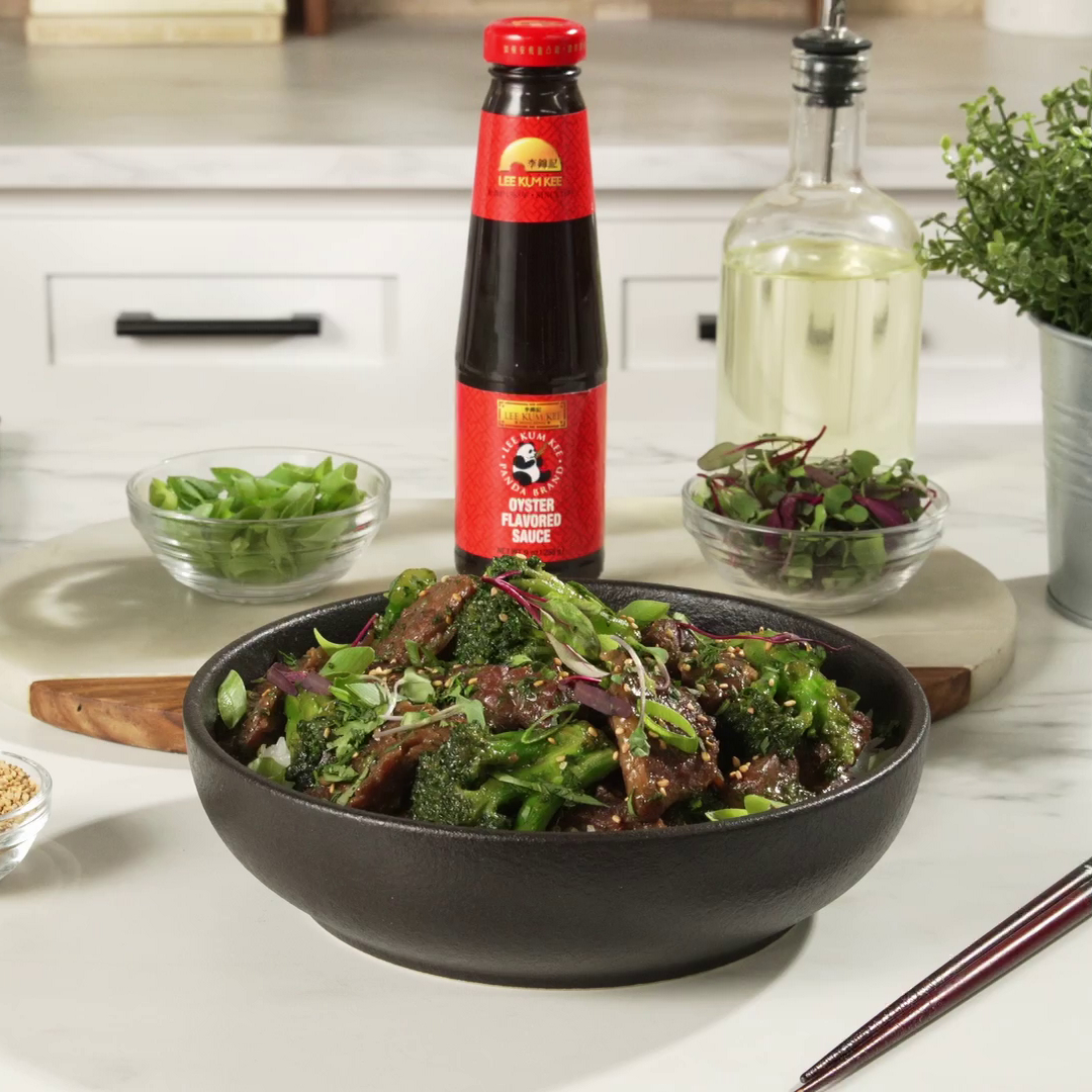 Prepared beef and broccoli stir-fry from Lee Kum Kee’s recipe accompanied by Lee Kum Kee Panda Brand Oyster Flavored Sauce 