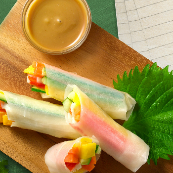 Easy Vietnamese spring roll recipe displayed next to a doping bowl of Lee Kum Kee Sriracha Mayo