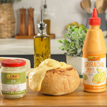 A prepared bread bowl with mac and cheese gnocchi from Lee Kum Kee’s recipe