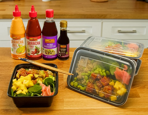 Prepared poke meal prep bowls and Lee Kum Kee sauces