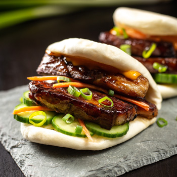 A pork belly bao buns recipe flavored with Lee Kum Kee Hoisin Sauce.