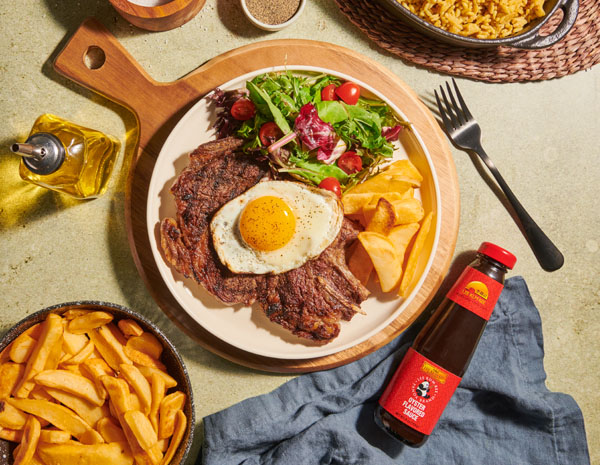 Portuguese bitoque steak and side dishes