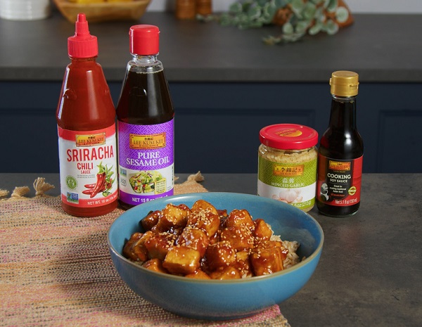 Sesame tofu recipe in a bowl, alongside the Lee Kum Kee sauces used in the dish